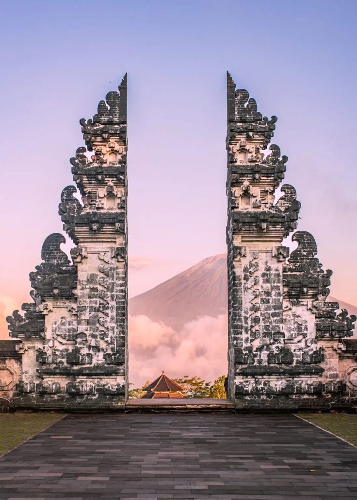 Traditional Balinese temple gate framing Mount Agung in Indonesia